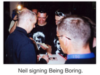 Neil signing Being Boring.