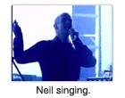 Neil singing.