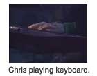 Chris playing keyboard.