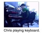 Chris playing keyboard.