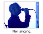 Neil singing.