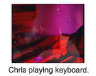 Chris playing keyboard.