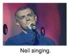 Neil singing.