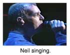 Neil singing.