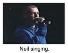 Neil singing.