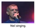 Neil singing.