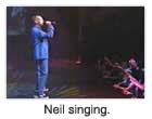 Neil singing.