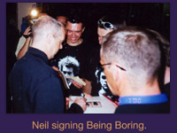 Neil signing Being Boring.