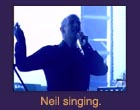 Neil singing.