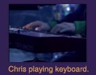 Chris playing keyboard.