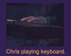 Chris playing keyboard.