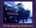 Chris playing keyboard.