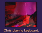 Chris playing keyboard.