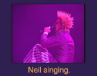 Neil singing.