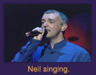 Neil singing.