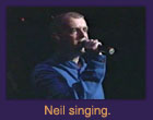 Neil singing.