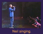 Neil singing.